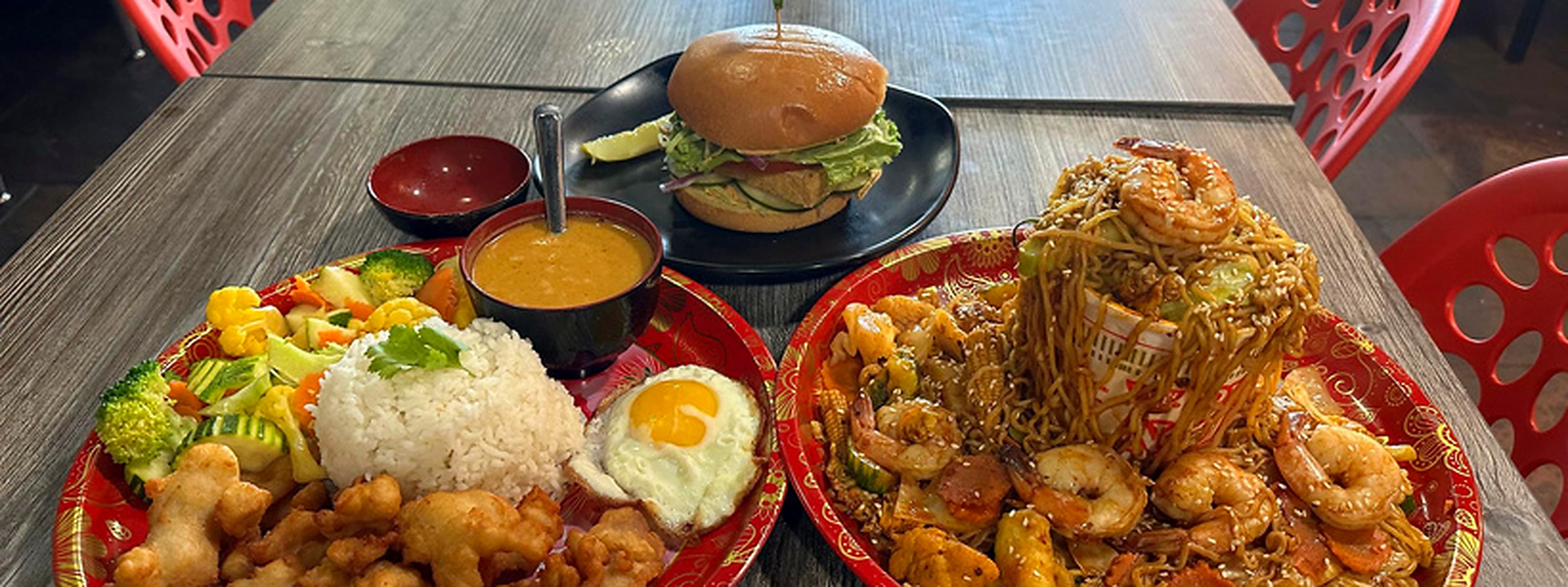 Thai dishes spread across a restaurant table