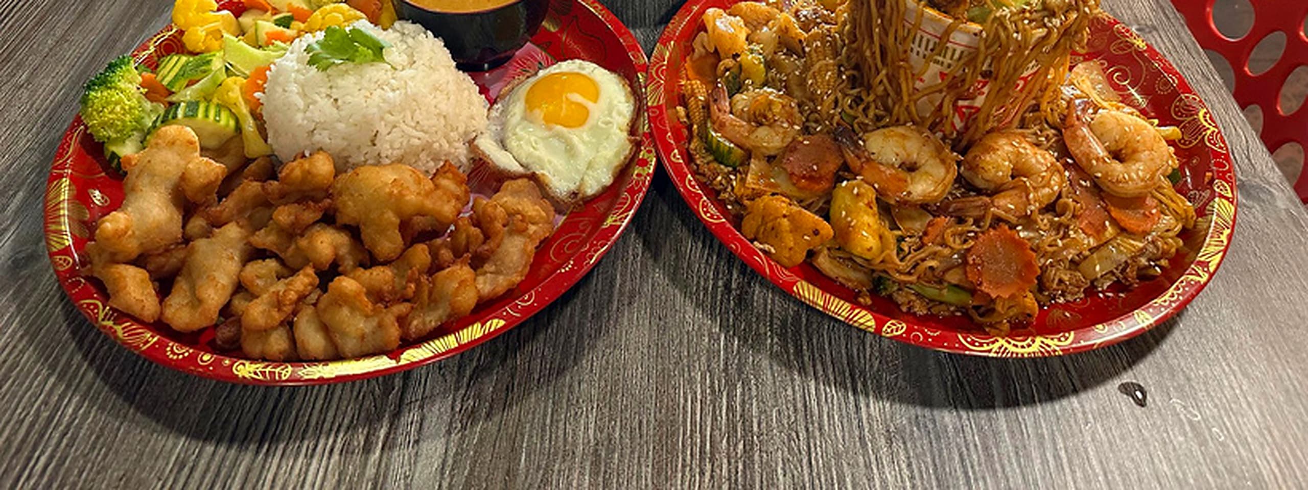 Bangkok Grill table spread with Thai dishes
